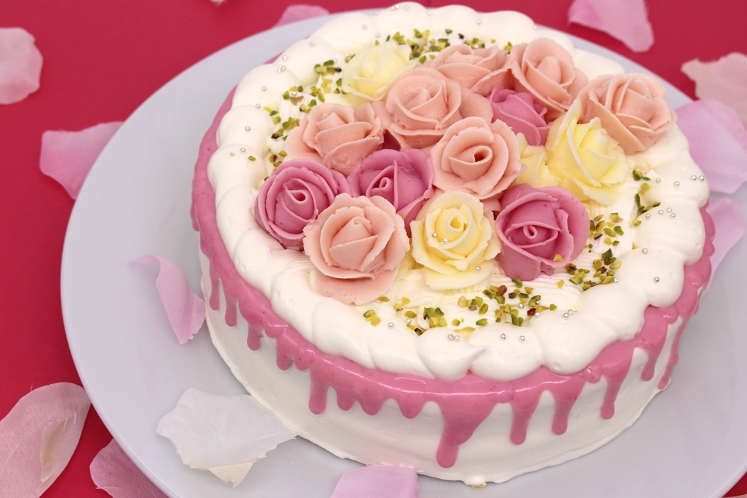 ピンクのキャンドルケーキの画像